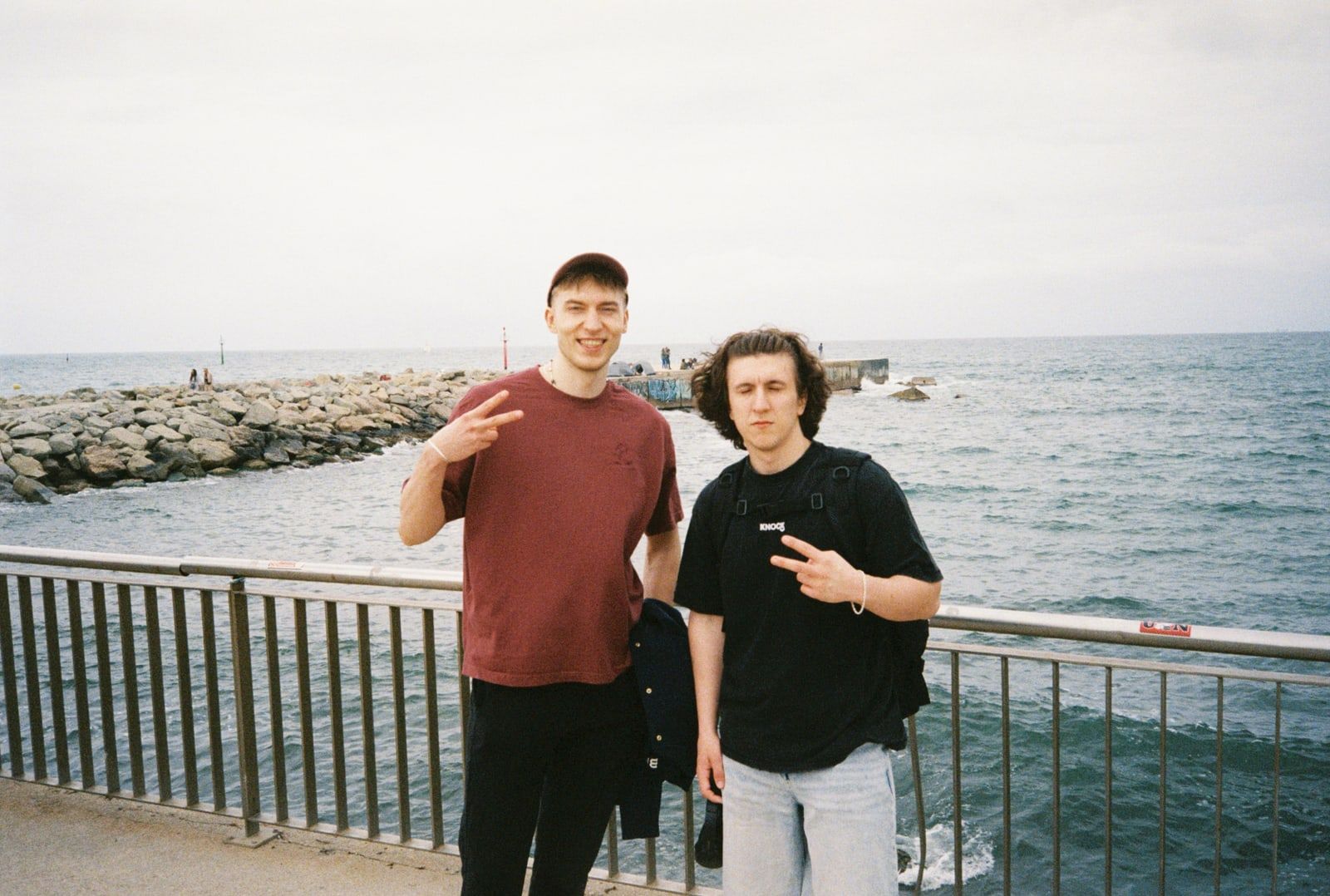 Two colleagues on a seaside promenade